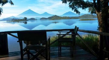 A View of Volcanoes ranges from a Lake Mutanda, private luxury safari lodge outside Bwindi.